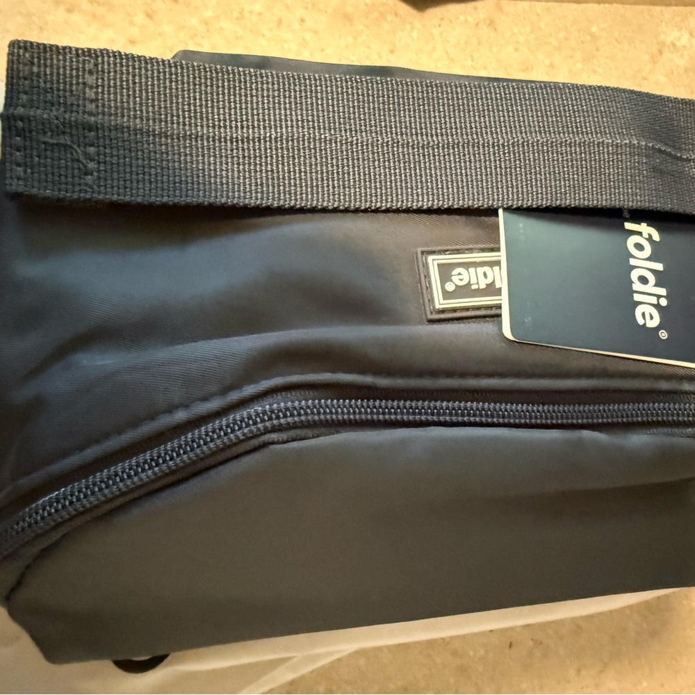 Foldie cross body bag for travel. Great travel bag for avoiding pickpockets.